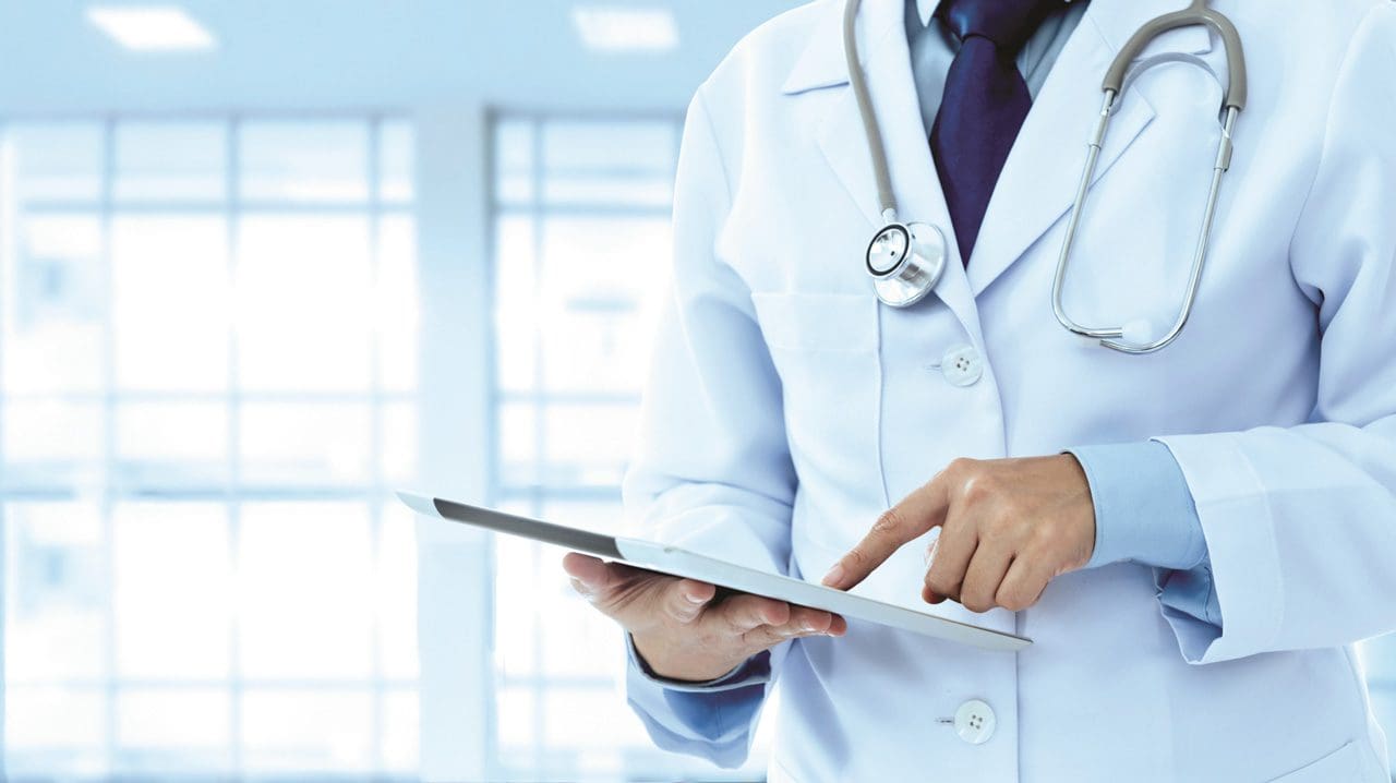 Doctor Using Tablet-1920 doctor using tablet