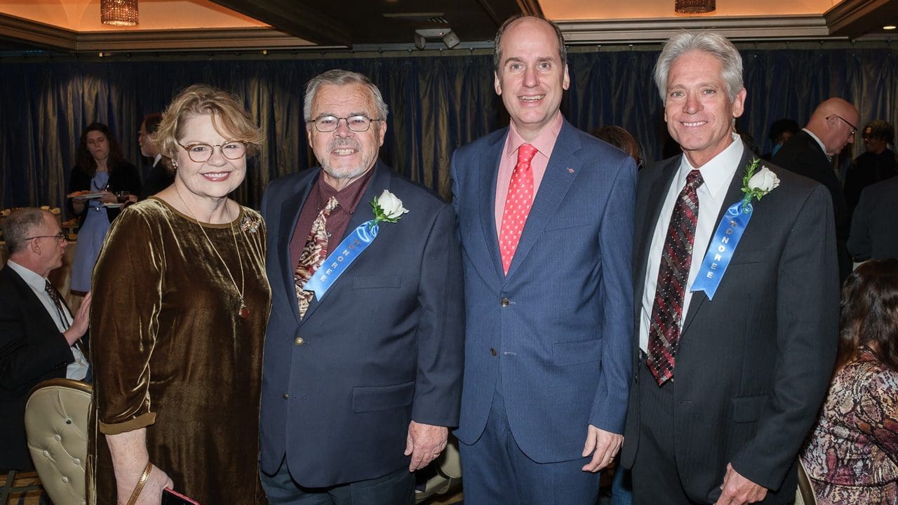 Award participants posing for a picture.