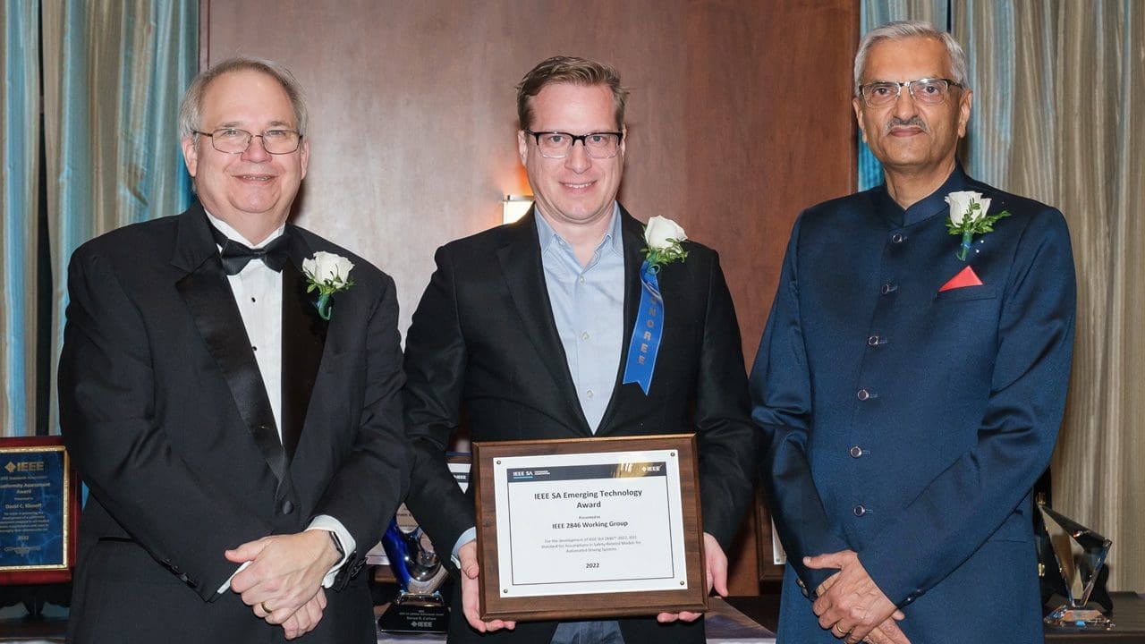 Award participants posing for a picture.