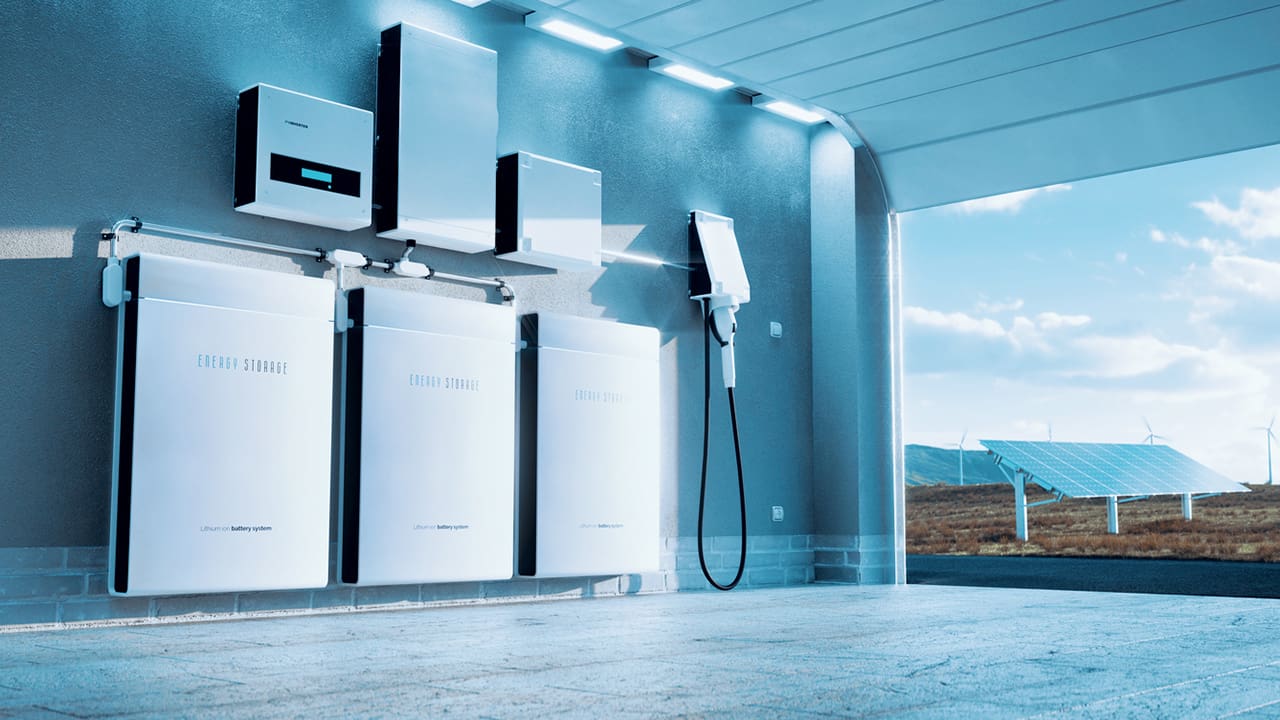 Looking at a garage with multiple energy storage solutions and a smart charger.